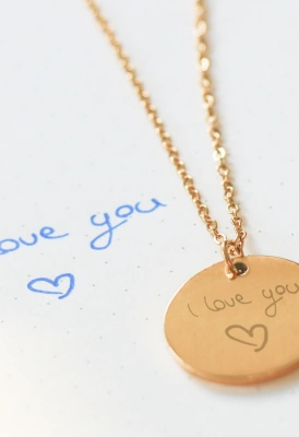 charm with handwritten messafe asa  gift for the whole family