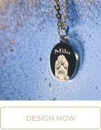 engraving puppy paw on a charm